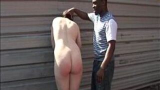 Interracial public spanking of white girl - porn video